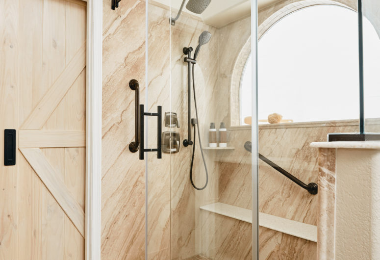 walk-in shower with sliding glass door