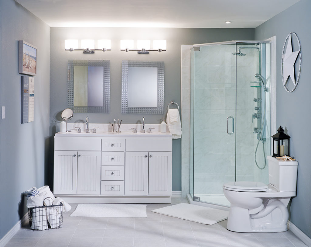 bathroom with glass corner shower and white vanity