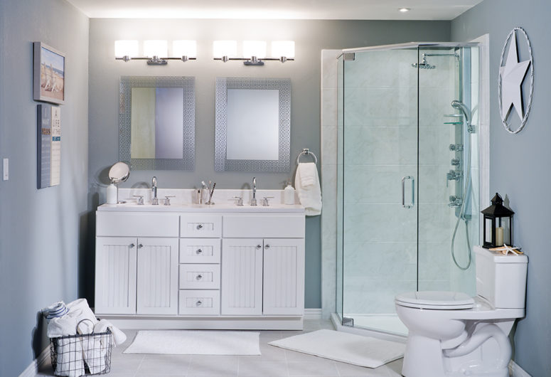 bathroom with glass corner shower and white vanity
