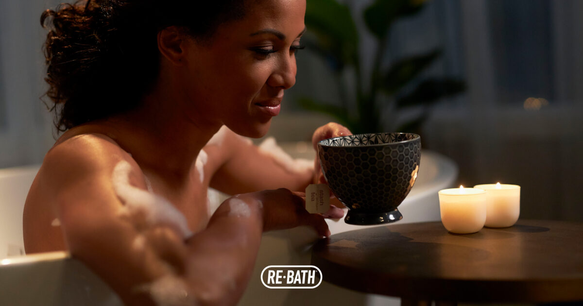 Woman relaxing in Re-Bath tub