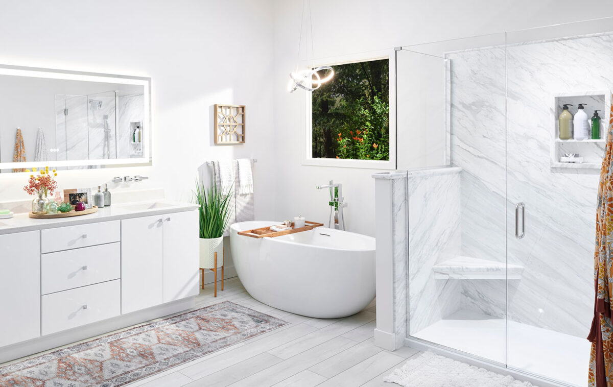 Modern bathroom with marble shower, freestanding tub, and vanity.